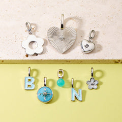 Harper Starburst Heart Charm